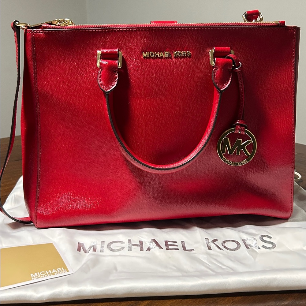 NWOT Michael Kors Satchel with top handles and adjustable removable strap.